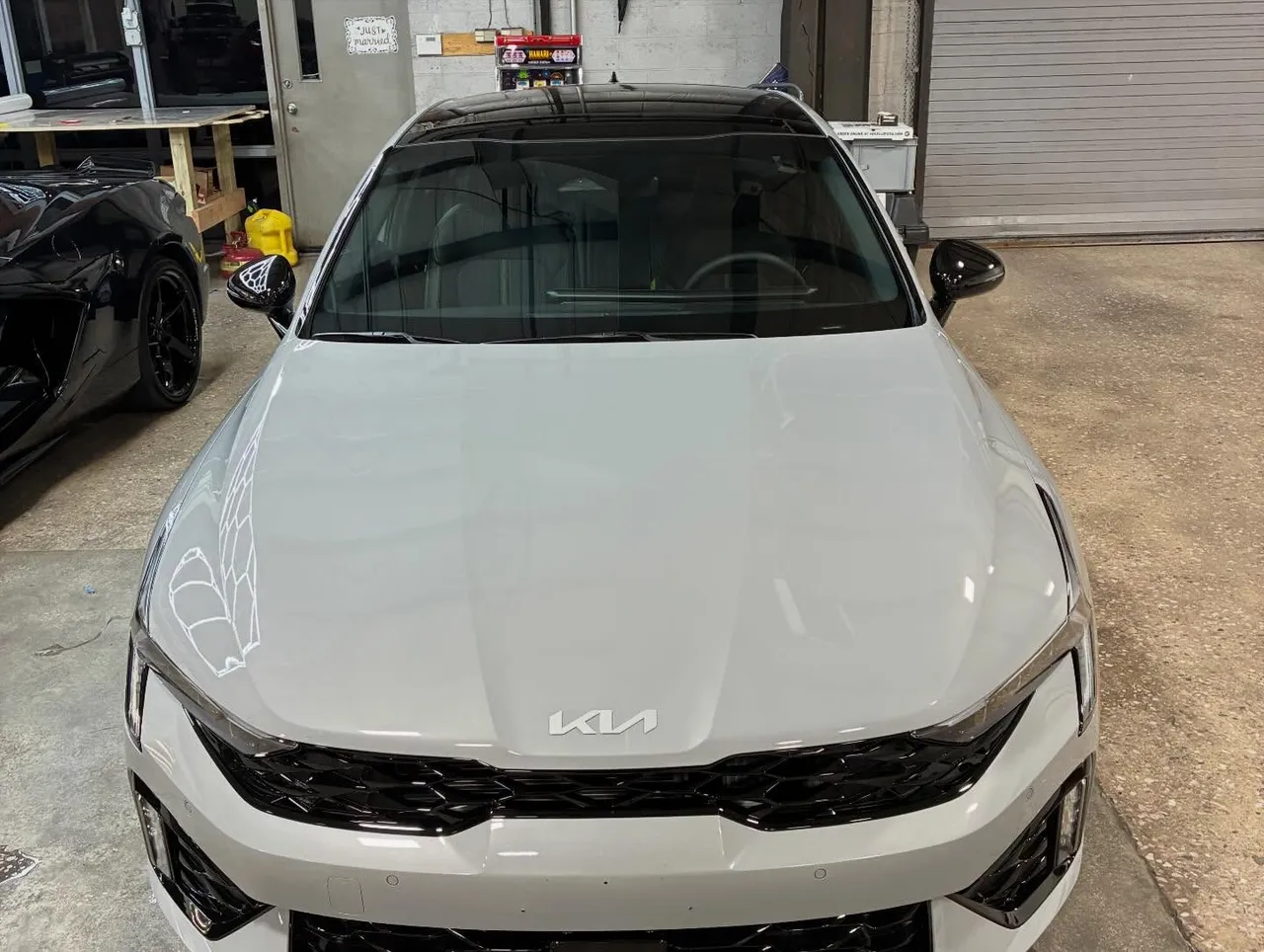 Front view of a gray Kia K5 with a high-gloss ceramic-coated hood at Maryland Clean Rides, Hanover, PA